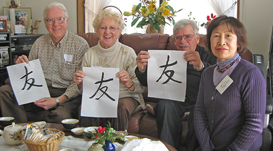 People Holding up Paper